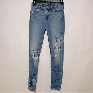 Floral printed light wash jeans